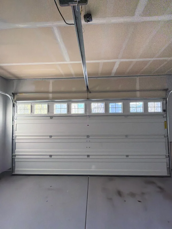 Garage door panel replacement Redmond WA